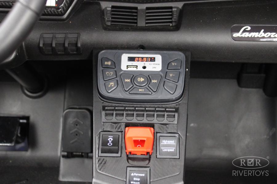 Детский электромобиль RiverToys Lamborghini Aventador SV (M777MM) синий