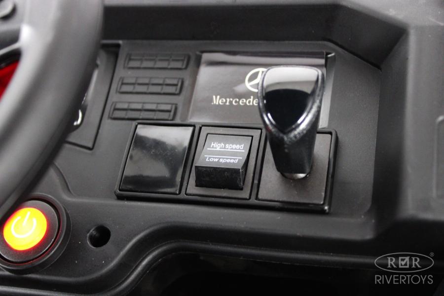 Детский электромобиль RiverToys Mercedes-Benz Actros 4WD (HL358) черный глянец