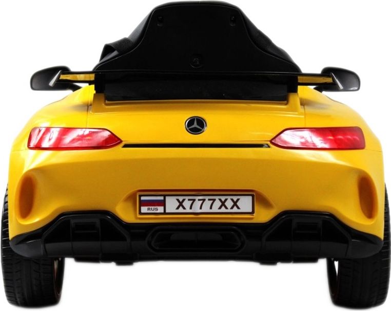 Детский электромобиль RiverToys Mercedes-Benz AMG GT X777XX желтый