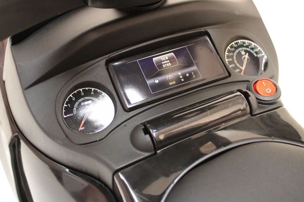 Детский толокар BMW M5 RiverToys (A999MP-M) (черный)