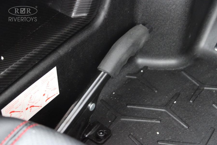 Детский электромобиль RiverToys Lamborghini Aventador SV (M777MM) красный