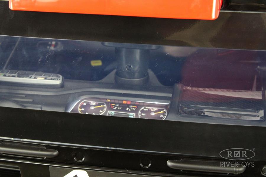 Детский электромобиль RiverToys Mercedes-Benz Axor с прицепом (H777HH) красный